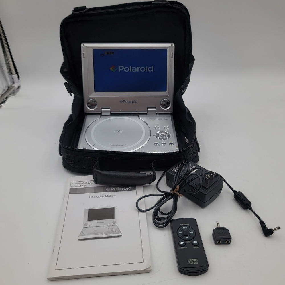 Polaroid PDM-0714 7in Portable DVD Player Silver Bundle Case Remote Manual